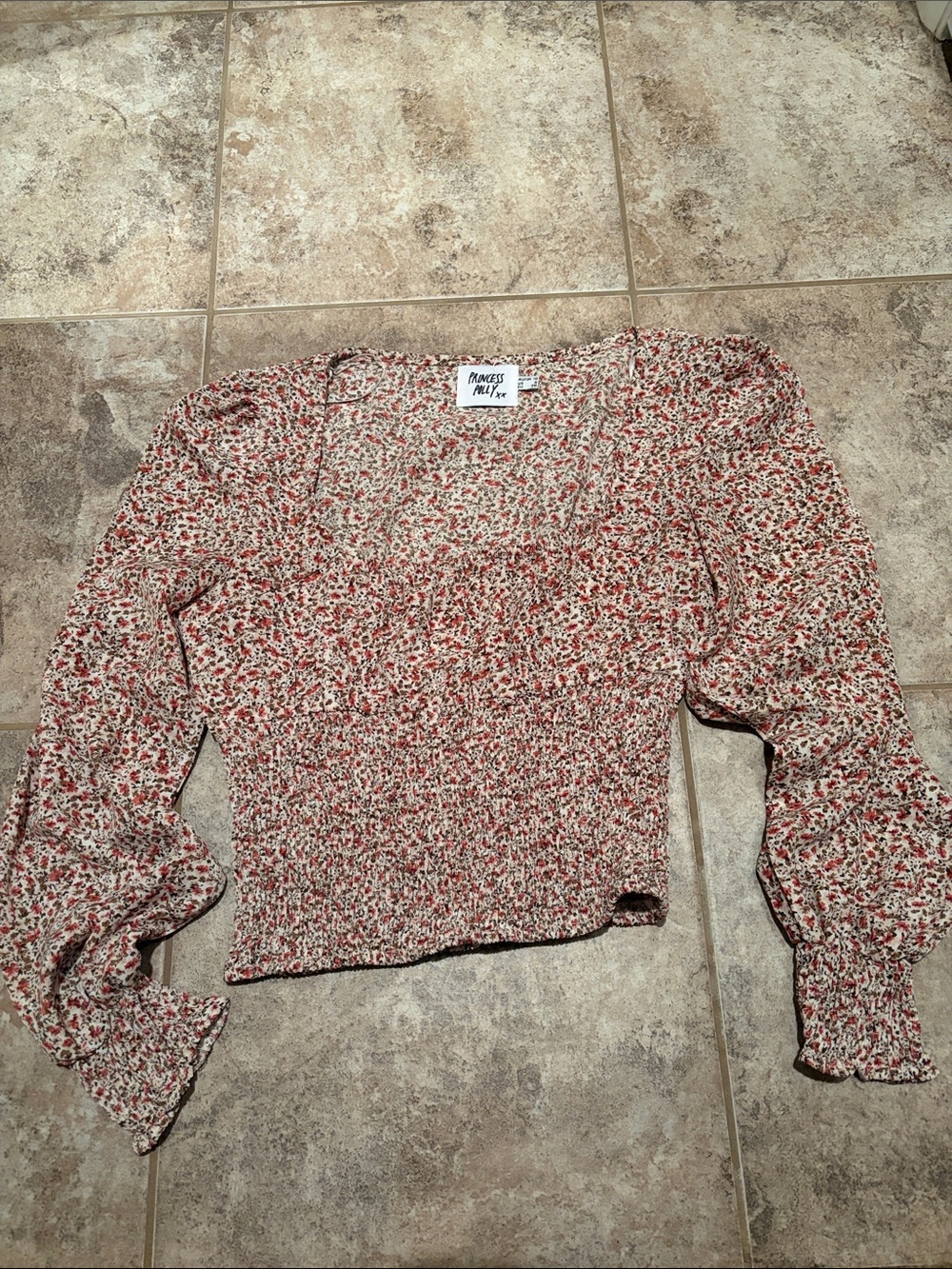 cream and red floral smocked long sleeve